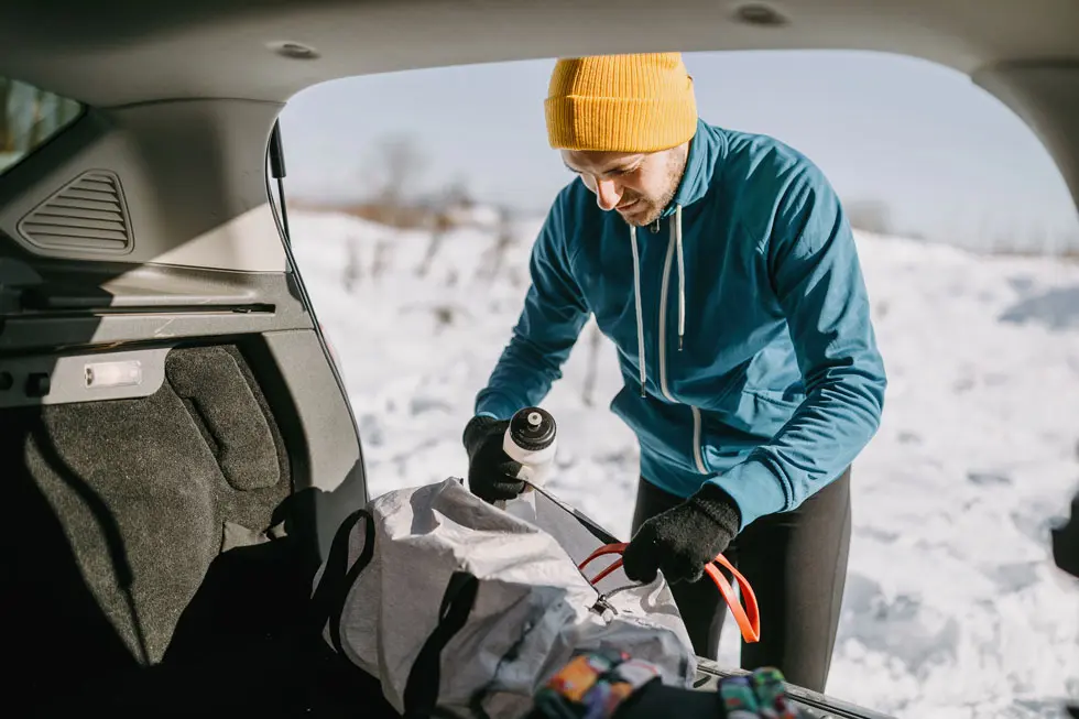 A man getting his vehicle ready to be shipped with Posey Logistics